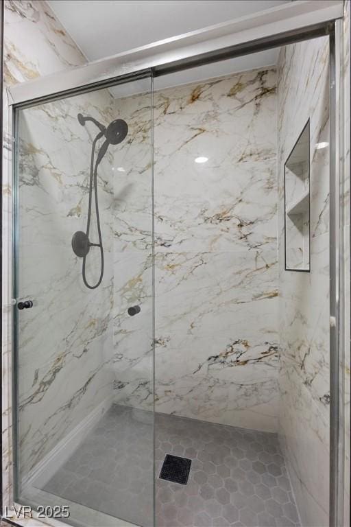 321 Oil Lantern Ln, Las Vegas, NV 89145 - bathroom featuring a marble finish shower