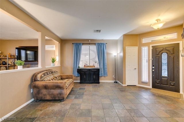 4512 Long Horse Ct, Las Vegas, NV 89147 - entrance foyer featuring baseboards and stone finish flooring