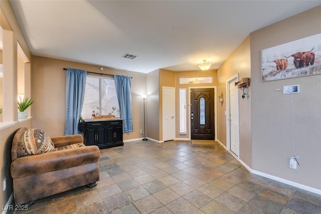 4512 Long Horse Ct, Las Vegas, NV 89147 - foyer entrance with stone tile floors and baseboards