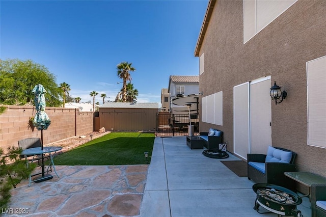 4512 Long Horse Ct, Las Vegas, NV 89147 - fenced backyard with a patio and a gate
