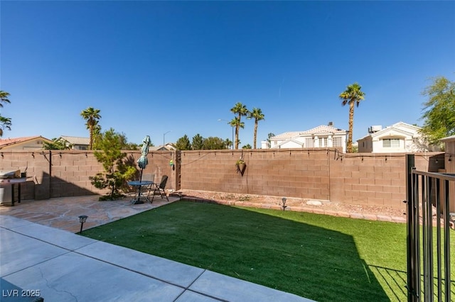 4512 Long Horse Ct, Las Vegas, NV 89147 - fenced backyard featuring a patio area