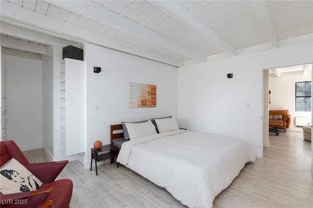 4778 Knotty Pine Way, Las Vegas, NV 89124 - bedroom with light wood finished floors and beam ceiling