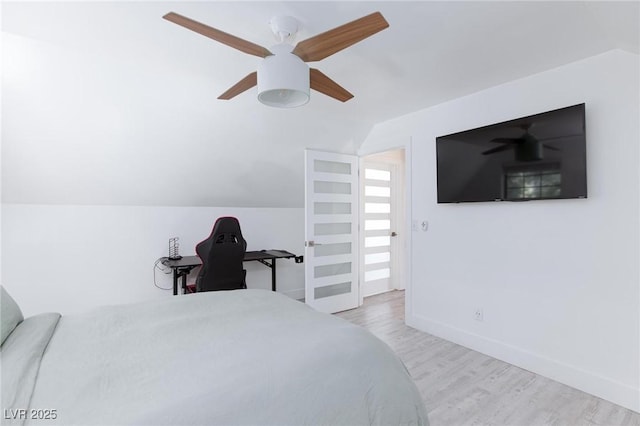 4778 Knotty Pine Way, Las Vegas, NV 89124 - bedroom featuring vaulted ceiling, wood finished floors, and a ceiling fan
