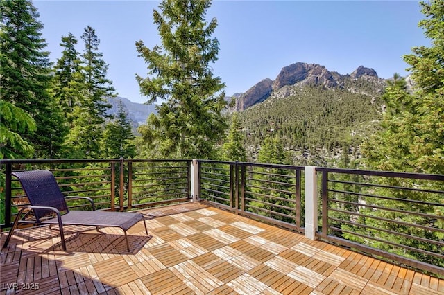4778 Knotty Pine Way, Las Vegas, NV 89124 - wooden deck with a mountain view