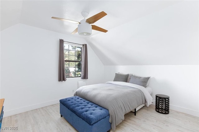 4778 Knotty Pine Way, Las Vegas, NV 89124 - bedroom featuring vaulted ceiling, wood finished floors, and a ceiling fan