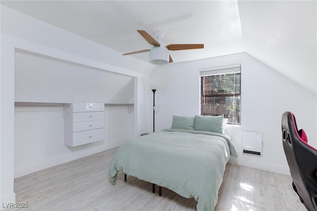4778 Knotty Pine Way, Las Vegas, NV 89124 - bedroom with lofted ceiling, light wood-style flooring, and ceiling fan