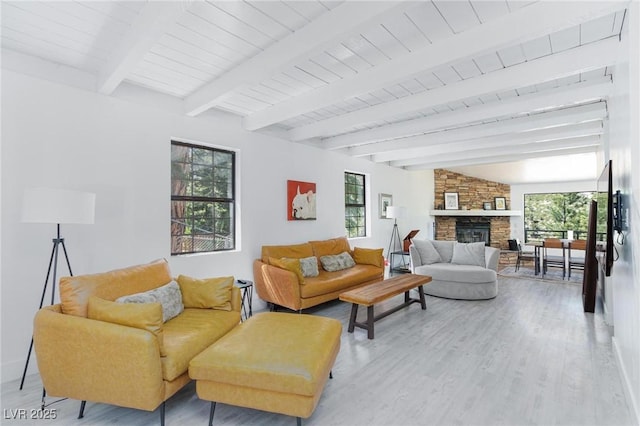 4778 Knotty Pine Way, Las Vegas, NV 89124 - living area featuring a fireplace, light wood-style floors, plenty of natural light, and a wooden ceiling with exposed beams