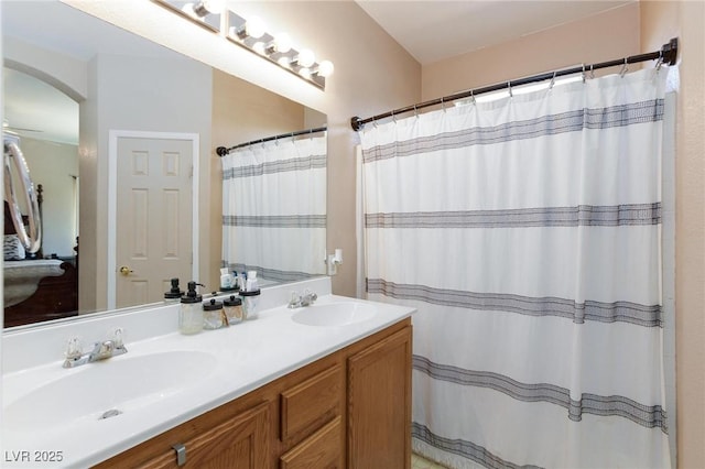 6170 E Sahara Ave Unit 1076, Las Vegas, NV 89142 - full bathroom featuring double vanity and a shower with shower curtain