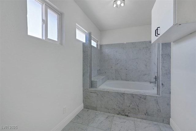1385 Morning Sun Way, Las Vegas, NV 89110 - bathroom featuring marble look tile flooring and a garden tub