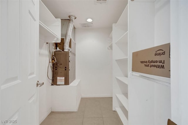1385 Morning Sun Way, Las Vegas, NV 89110 - spacious closet with light tile patterned flooring