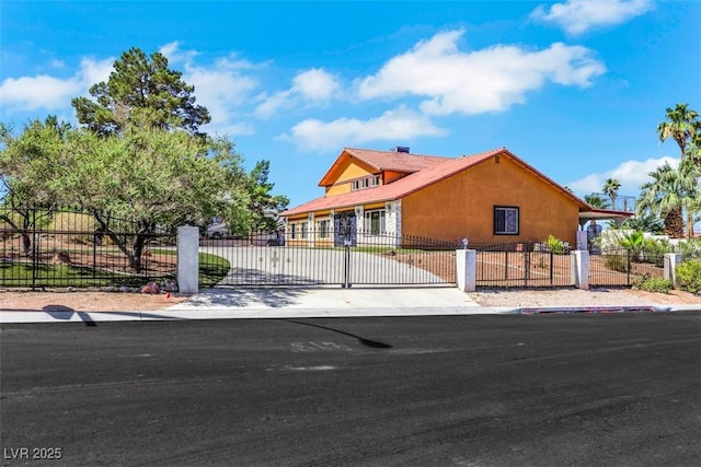 1385 Morning Sun Way, Las Vegas, NV 89110 - view of front of house featuring a fenced front yard, driveway, and a gate