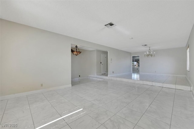 1385 Morning Sun Way, Las Vegas, NV 89110 - unfurnished room with a chandelier and baseboards