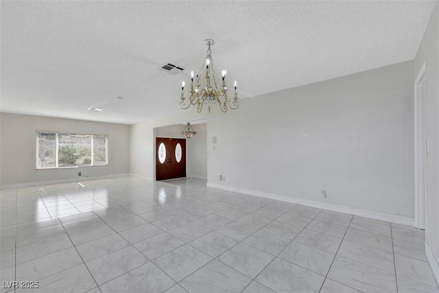 1385 Morning Sun Way, Las Vegas, NV 89110 - unfurnished room with a chandelier and light tile patterned floors