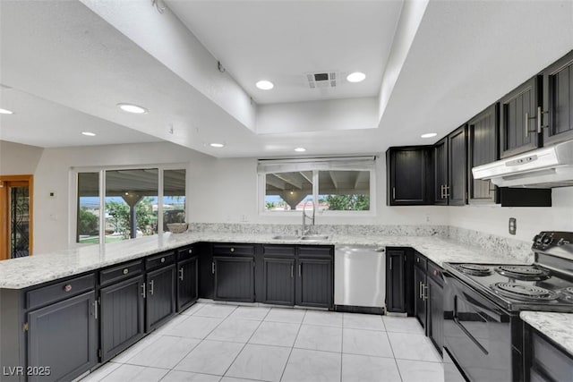 1385 Morning Sun Way, Las Vegas, NV 89110 - kitchen featuring stainless steel dishwasher, black electric range oven, under cabinet range hood, a peninsula, and a raised ceiling