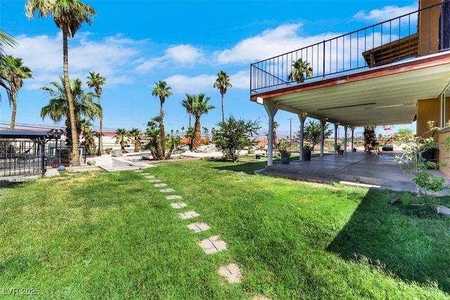 1385 Morning Sun Way, Las Vegas, NV 89110 - view of green lawn with a patio area