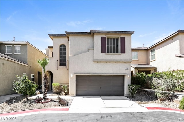 6591 Gertrude Ct, Las Vegas, NV 89141 - view of front facade featuring stucco siding, a garage, and concrete driveway