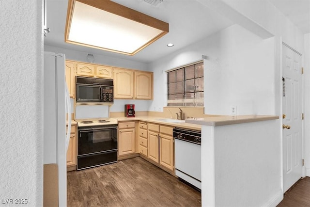 2851 S Valley View Blvd Unit 1120, Las Vegas, NV 89102 - kitchen with white appliances, light brown cabinets, recessed lighting, dark wood-style floors, and light countertops