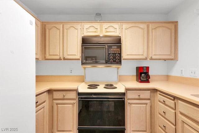 2851 S Valley View Blvd Unit 1120, Las Vegas, NV 89102 - kitchen with black microwave, light brown cabinetry, and range with electric stovetop