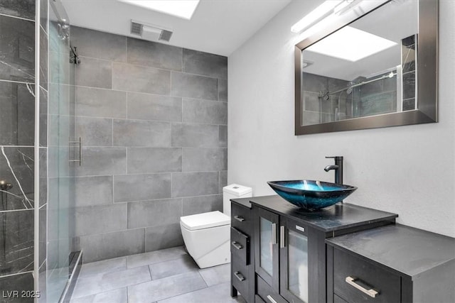 2851 S Valley View Blvd Unit 1120, Las Vegas, NV 89102 - full bathroom featuring a stall shower, vanity, and tile patterned floors