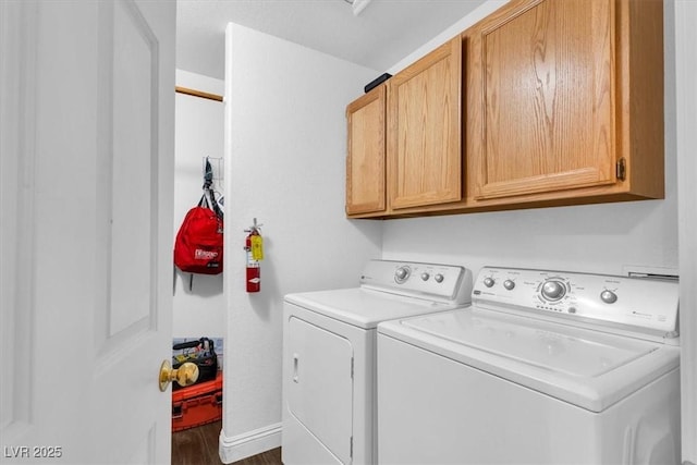 2851 S Valley View Blvd Unit 1120, Las Vegas, NV 89102 - washroom with washing machine and dryer, cabinet space, and dark wood finished floors