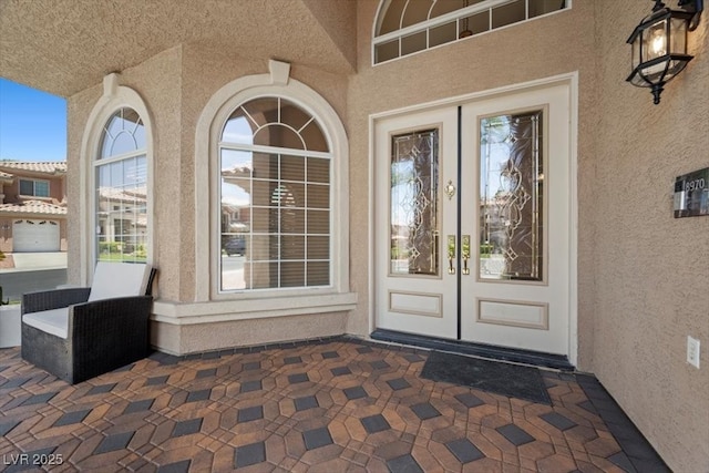 8970 Lansberry Ct, Las Vegas, NV 89147 - property entrance featuring stucco siding and french doors