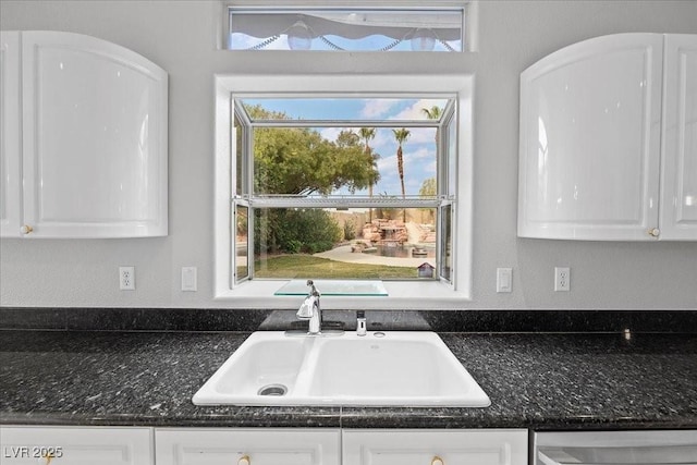 8970 Lansberry Ct, Las Vegas, NV 89147 - kitchen with white cabinets