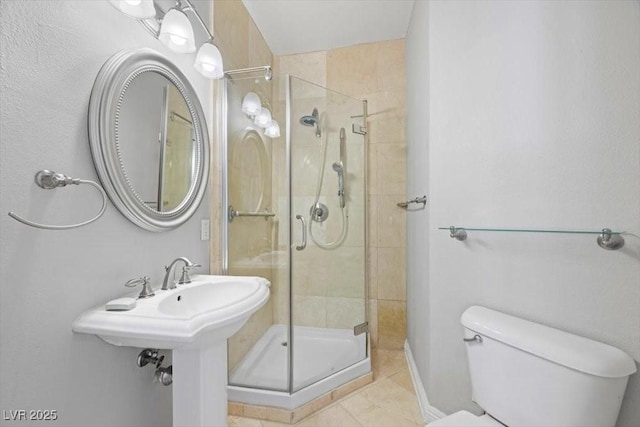 8970 Lansberry Ct, Las Vegas, NV 89147 - full bath with a shower stall and tile patterned floors