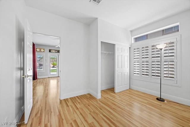 8970 Lansberry Ct, Las Vegas, NV 89147 - unfurnished bedroom featuring light wood-style flooring and a closet