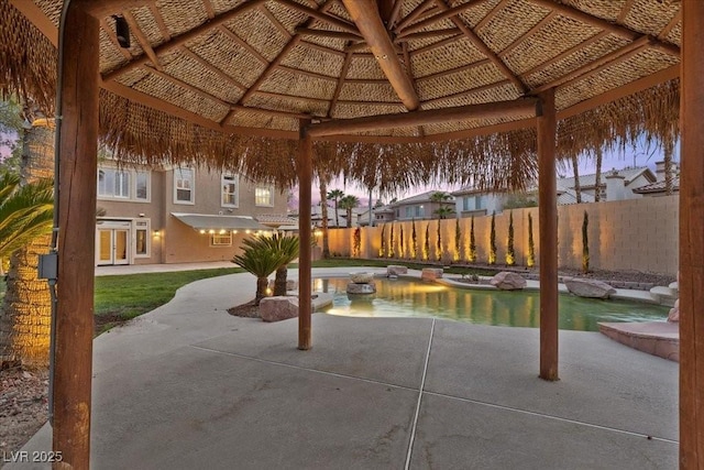 8970 Lansberry Ct, Las Vegas, NV 89147 - fenced backyard with a gazebo, a patio area, and french doors