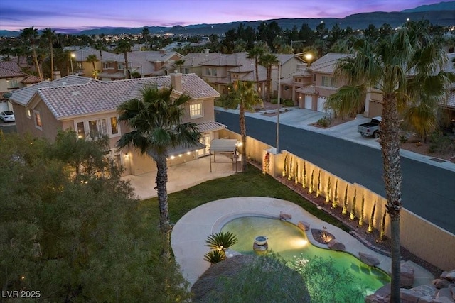 8970 Lansberry Ct, Las Vegas, NV 89147 - aerial perspective of suburban area with a mountainous background