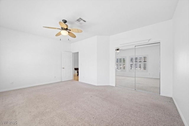 8970 Lansberry Ct, Las Vegas, NV 89147 - unfurnished bedroom featuring carpet floors, a closet, and a ceiling fan