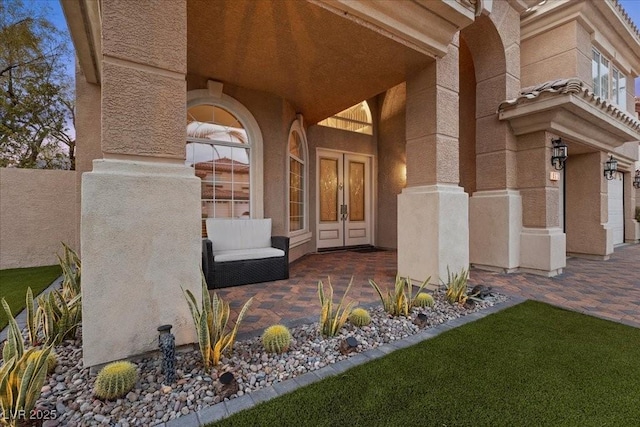 8970 Lansberry Ct, Las Vegas, NV 89147 - property entrance with french doors and stucco siding