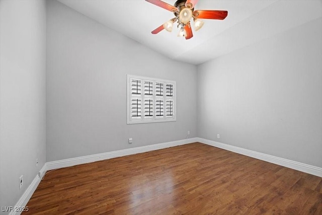 8970 Lansberry Ct, Las Vegas, NV 89147 - empty room with a ceiling fan, wood finished floors, and vaulted ceiling