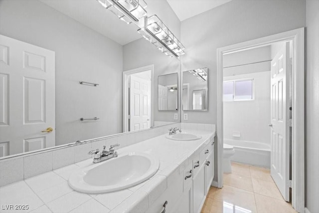 8970 Lansberry Ct, Las Vegas, NV 89147 - bathroom featuring double vanity, tile patterned flooring, and bathtub / shower combination