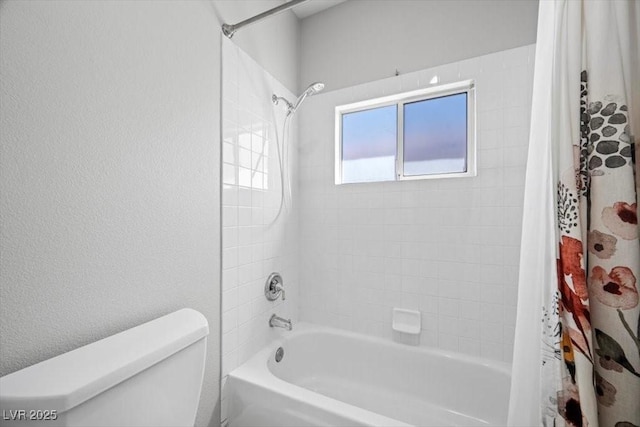 8970 Lansberry Ct, Las Vegas, NV 89147 - bathroom featuring shower / tub combo and a textured wall
