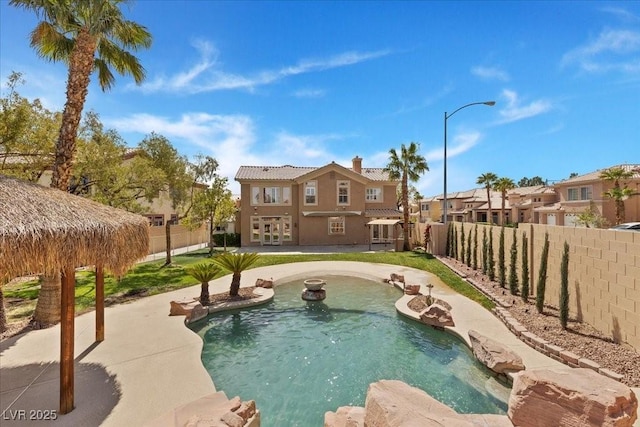 8970 Lansberry Ct, Las Vegas, NV 89147 - view of swimming pool with a fenced backyard, a patio area, and a residential view