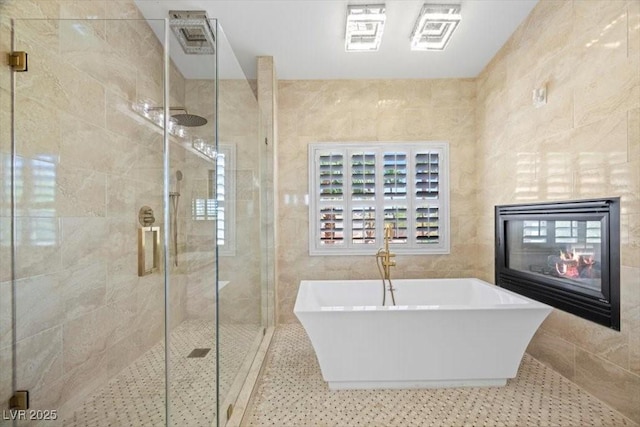 8970 Lansberry Ct, Las Vegas, NV 89147 - full bath with a freestanding tub, tile walls, and a shower stall