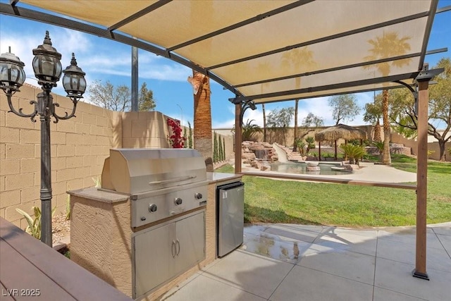 8970 Lansberry Ct, Las Vegas, NV 89147 - view of patio with an outdoor kitchen