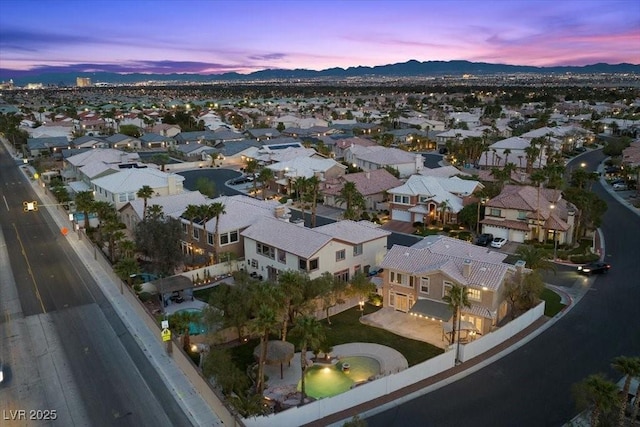 8970 Lansberry Ct, Las Vegas, NV 89147 - aerial view at dusk of a mountain view and a residential view