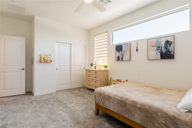 6927 Desert Finch St, North Las Vegas, NV 89084 - bedroom featuring carpet flooring, a closet, and a ceiling fan