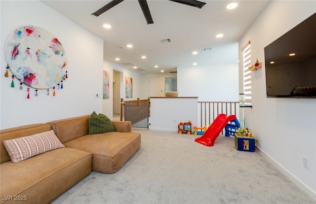 6927 Desert Finch St, North Las Vegas, NV 89084 - carpeted living area with ceiling fan and recessed lighting