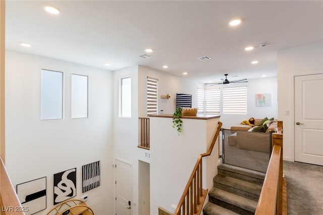 6927 Desert Finch St, North Las Vegas, NV 89084 - stairway featuring recessed lighting, a ceiling fan, and carpet
