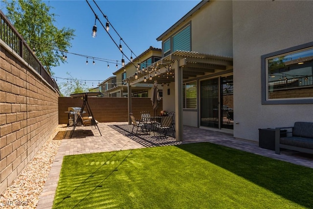 6927 Desert Finch St, North Las Vegas, NV 89084 - fenced backyard with a pergola and a patio