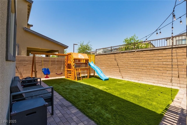 6927 Desert Finch St, North Las Vegas, NV 89084 - fenced backyard featuring a playground