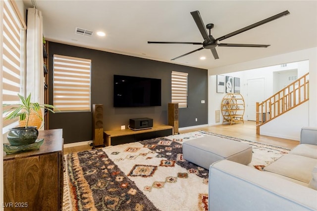 6927 Desert Finch St, North Las Vegas, NV 89084 - living room featuring ceiling fan, recessed lighting, wood finished floors, and stairs