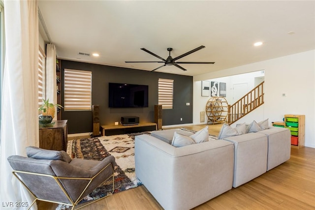 6927 Desert Finch St, North Las Vegas, NV 89084 - living room featuring a ceiling fan, stairs, light wood-style flooring, and recessed lighting