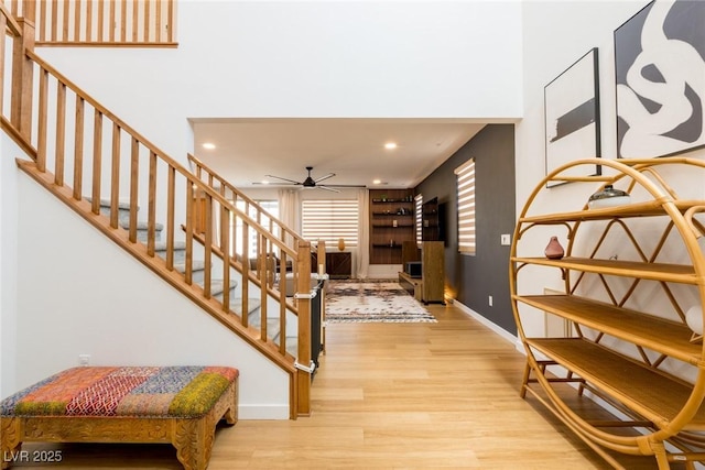 6927 Desert Finch St, North Las Vegas, NV 89084 - entrance foyer with wood finished floors, stairway, a ceiling fan, and recessed lighting