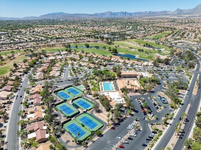 10413 Marymont Pl, Las Vegas, NV 89134 - aerial view of property's location with a golf club, a water and mountain view, and nearby suburban area