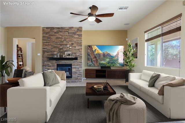 8604 Amber Autumn St, Las Vegas, NV 89131 - living room with a ceiling fan and a stone fireplace