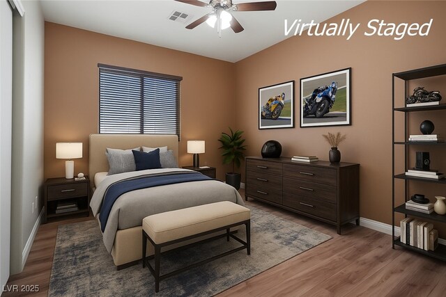 8604 Amber Autumn St, Las Vegas, NV 89131 - bedroom with light wood finished floors and ceiling fan